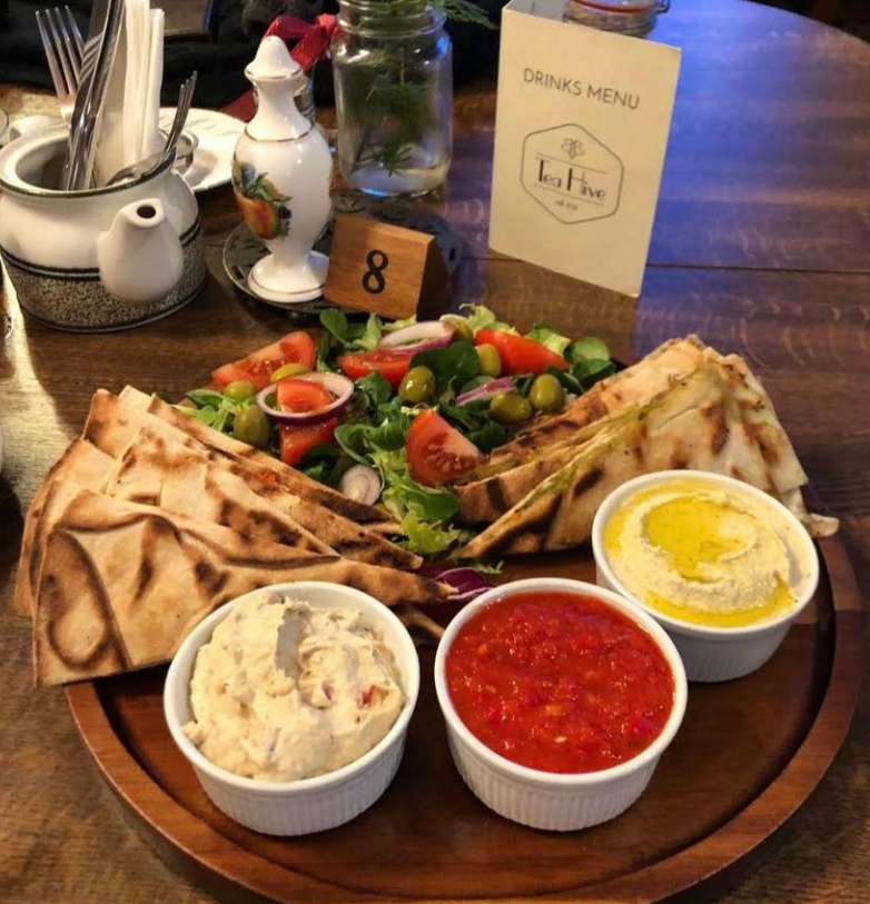 Mezze platter with hummus, salsa, salad and flatbread