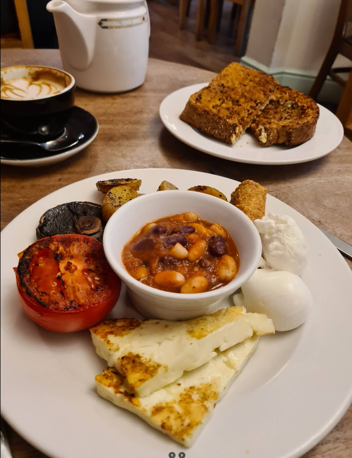 Veggie breakfast with halloumi, beans and grilled tomato
